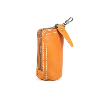 Jednostavne modne ključeve od auta u retro stilu, zamotan u kožnu переносную torbu za ključeve za dječake, pokloni